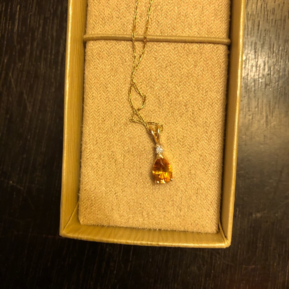 Ladies gold necklace.